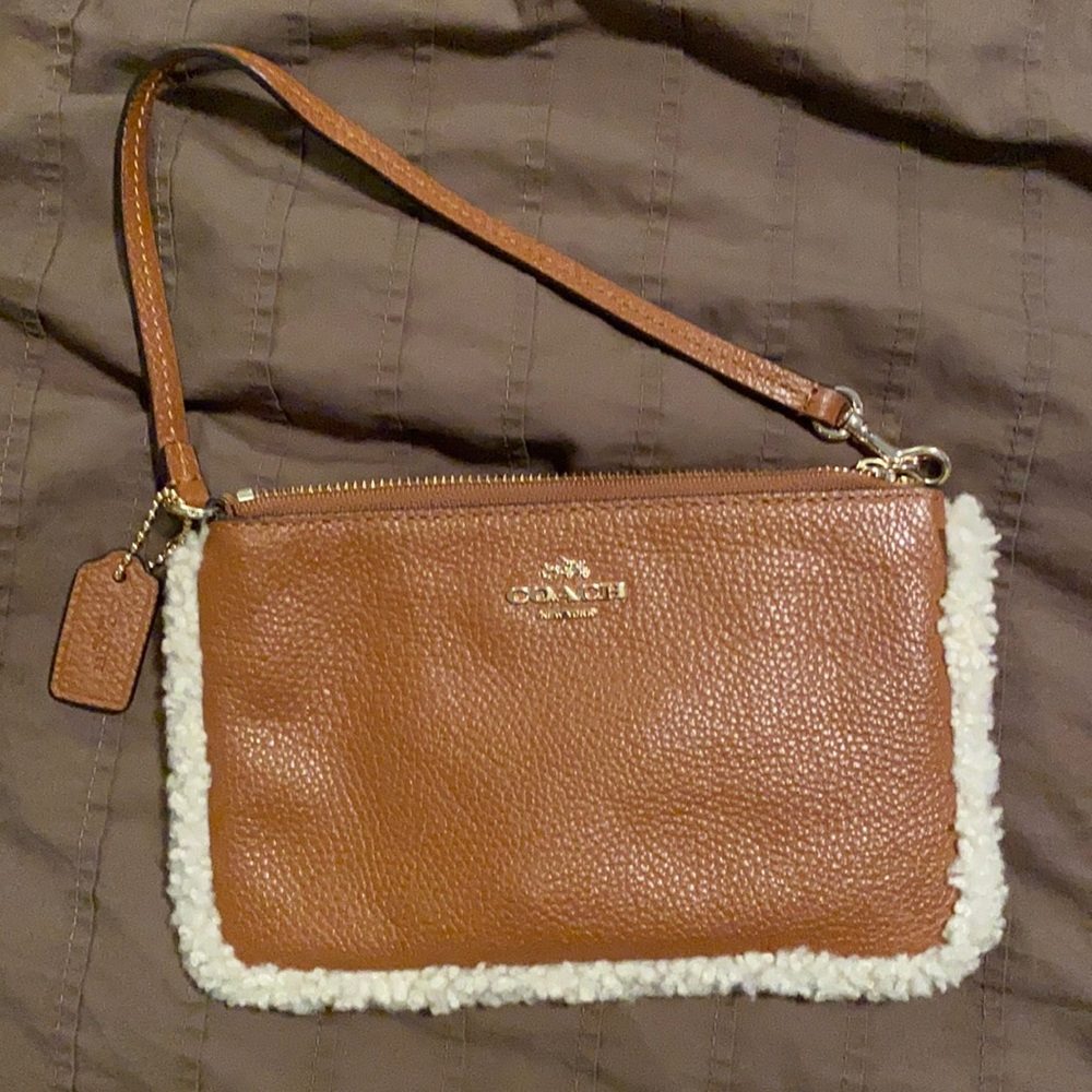 Coach wristlet with Sherpa edges